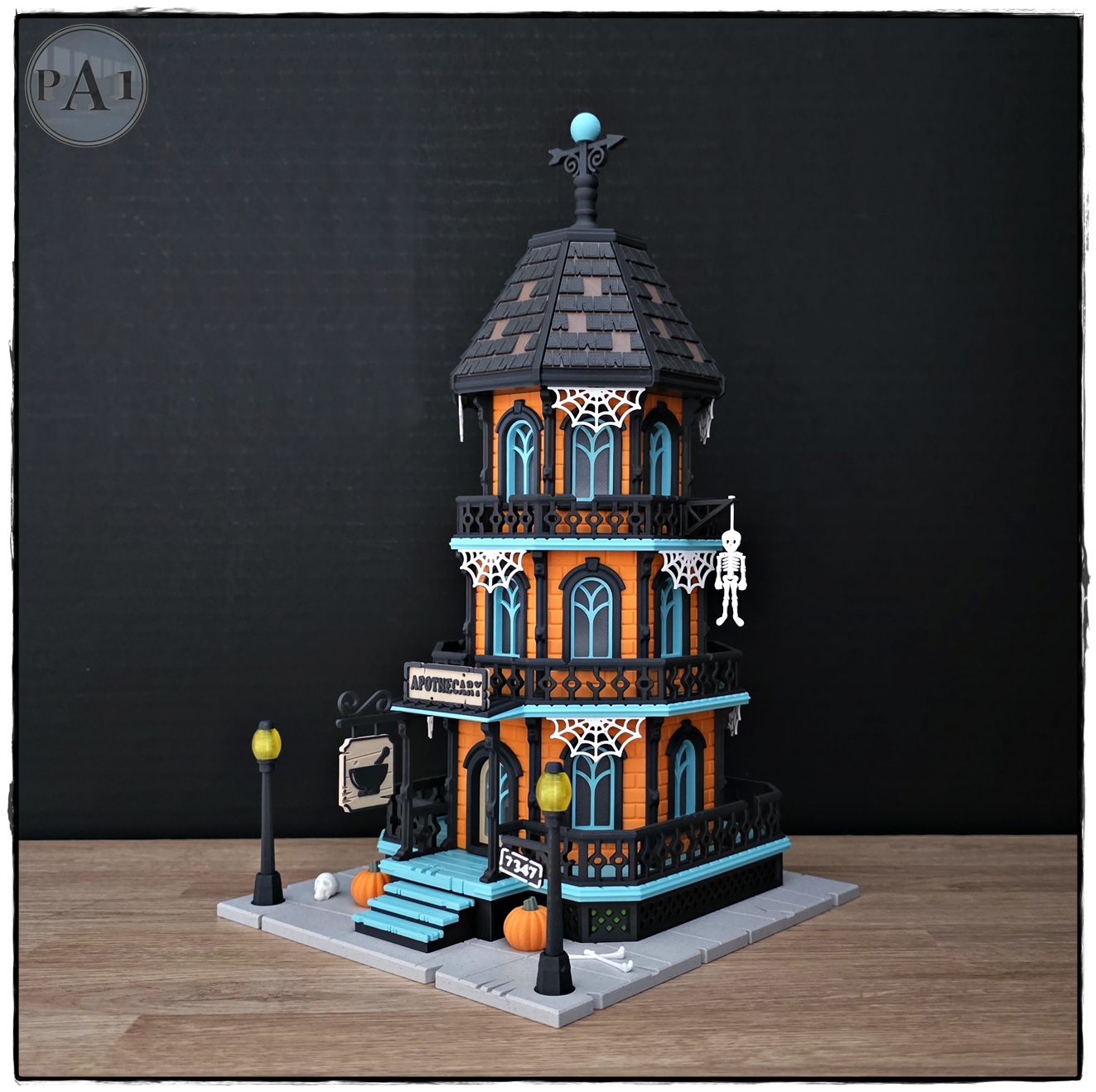 The Apothecary 3D printed three-story Victorian Halloween shop with street lamps, pumpkins and hanging skeleton