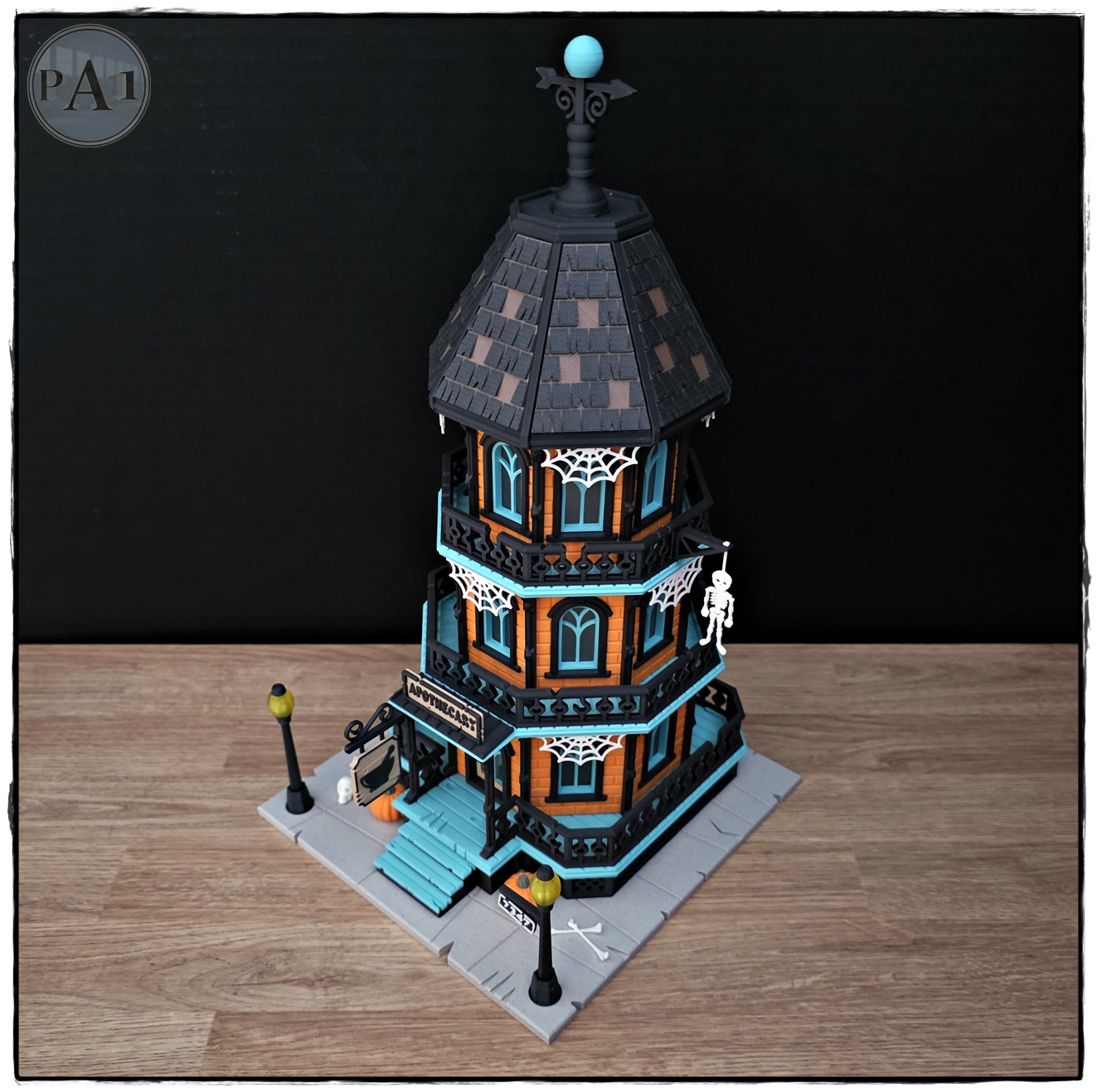 The Apothecary 3D printed three-story Victorian Halloween shop with street lamps, pumpkins and hanging skeleton