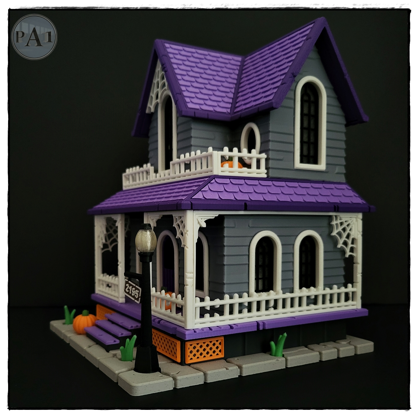 The Haunted House 3D printed Victorian Halloween house with purple roof, porch and glowing windows