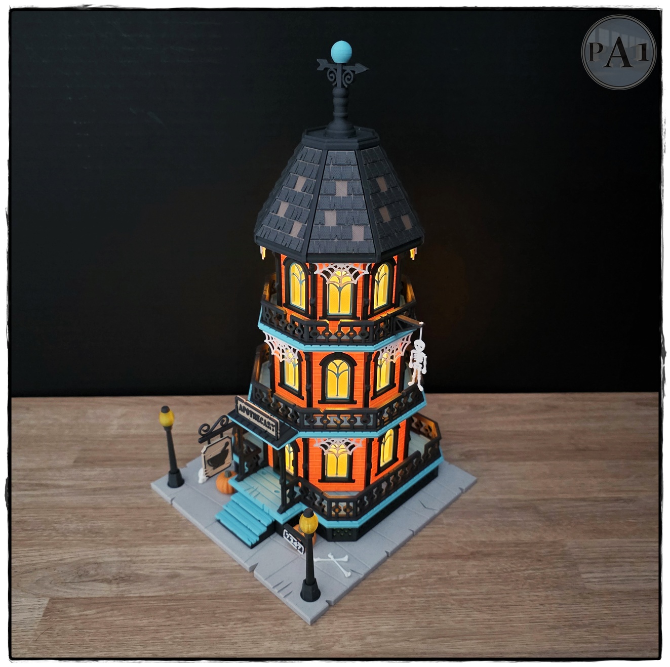 The Apothecary 3D printed three-story Victorian Halloween shop with street lamps, pumpkins and hanging skeleton