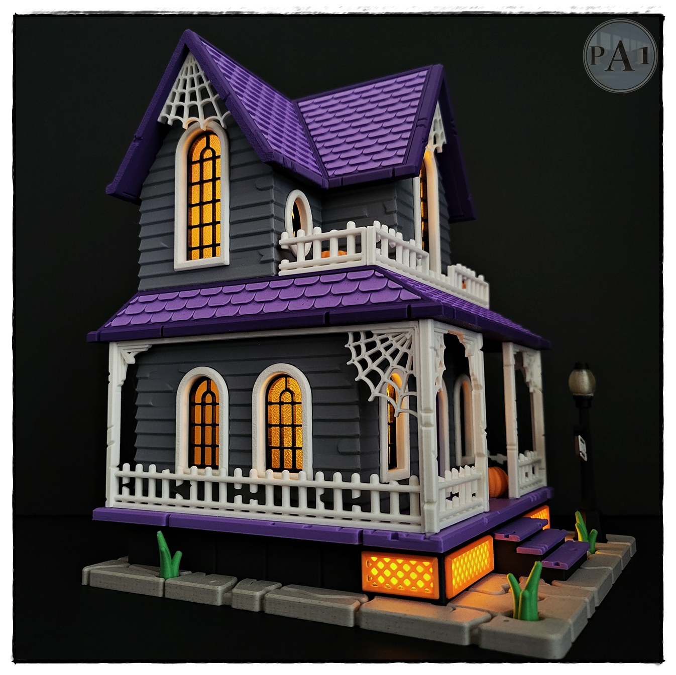 The Haunted House 3D printed Victorian Halloween house with purple roof, porch and glowing windows